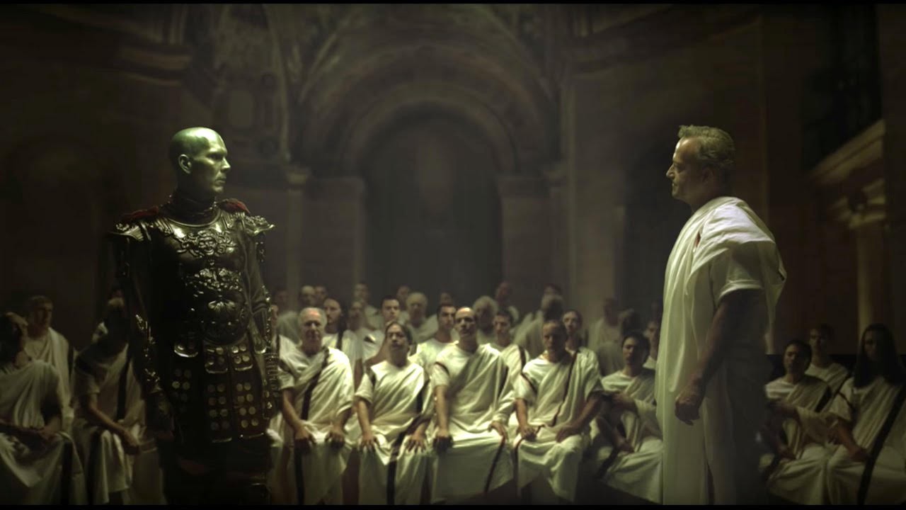 A scene depicting a Roman official standing before a seated figure in a judgment hall