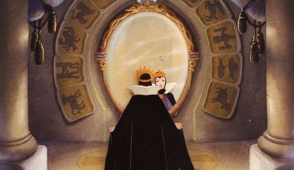 The Evil Queen from Snow White looking into her magic mirror