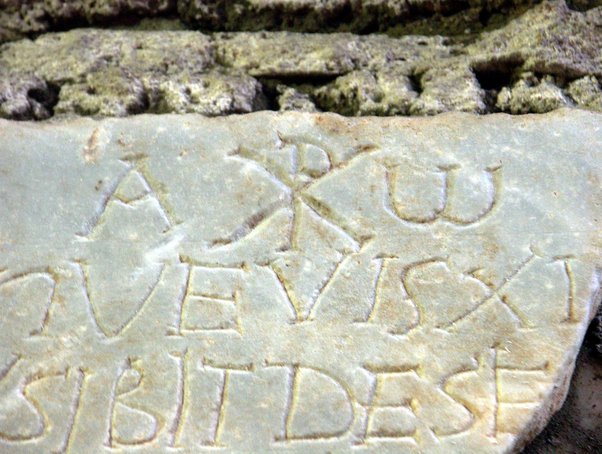 Why did John in Revelation 1:8 spell out "alpha" but use just the letter "Ω," instead of spelling "omega"?